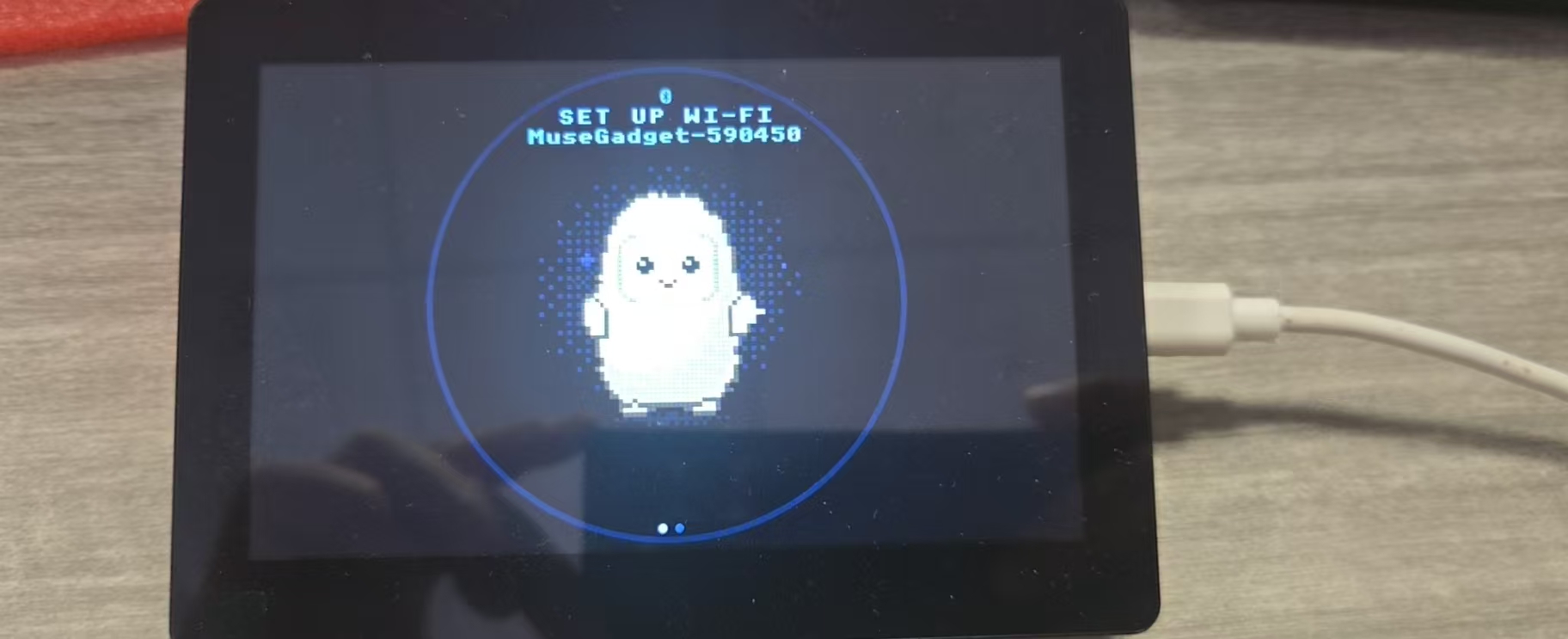 Muse Gadget — Wi-Fi companion device showing SET UP WI-FI screen with friendly mascot character